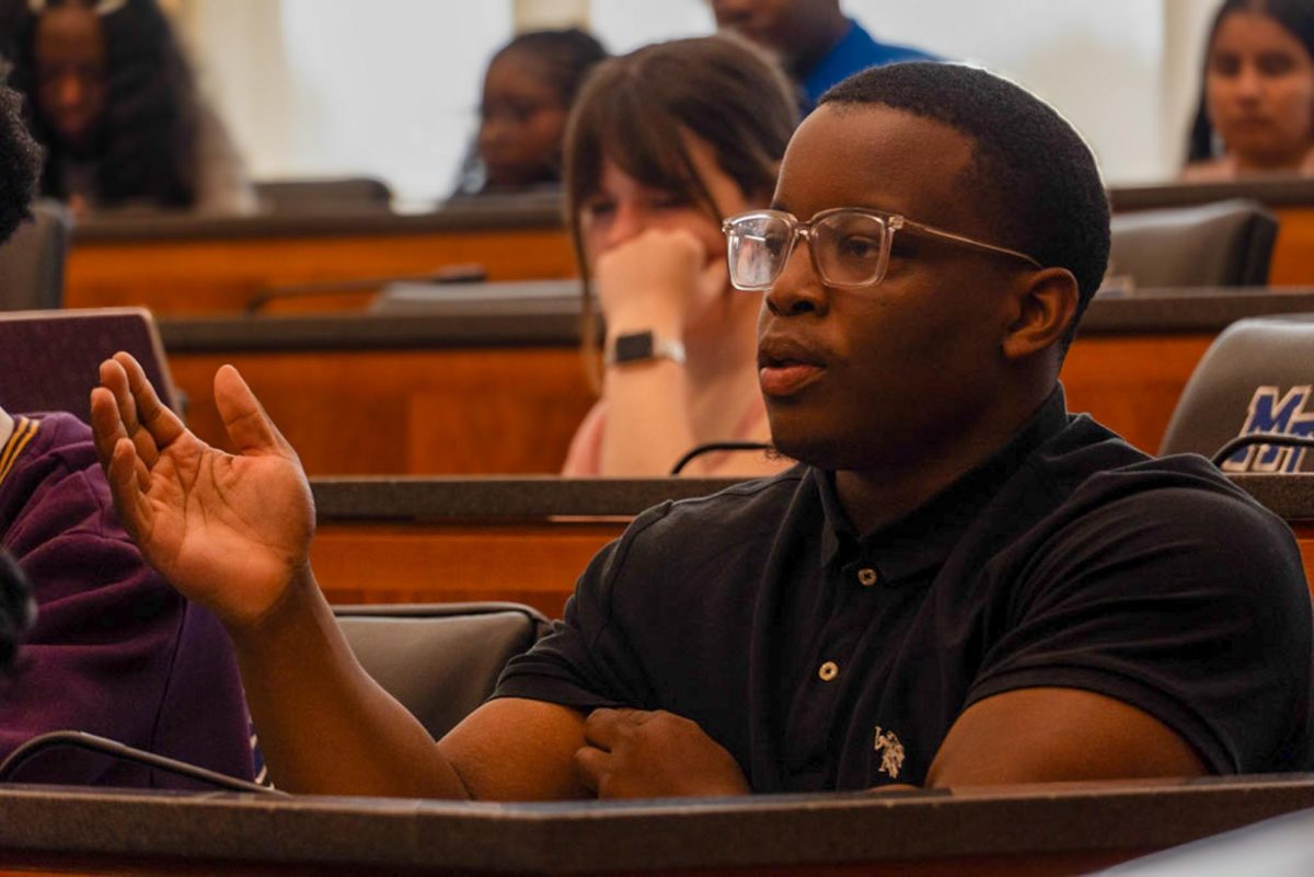 Student asking a question to President McPhee on Sept. 22, 2025.