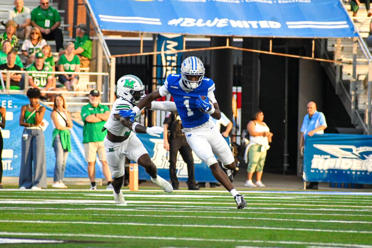 MTSU's Nahzae Cox runs with the ball after catching a pass against Marshall, at Floyd Stadium on Sept. 20, 2025.