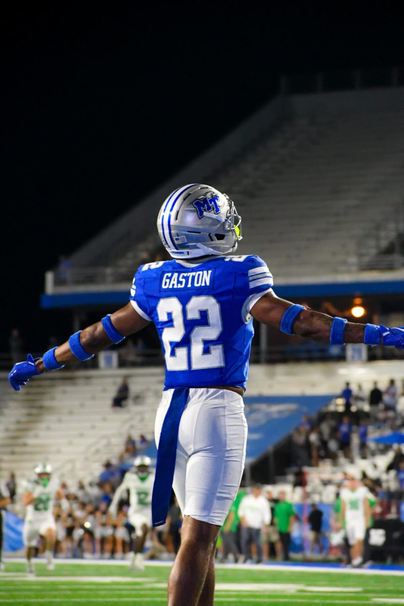 MTSU's Juwon Gaston extends his arms after a play against Marshall, at Floyd Stadium on Sept. 20, 2025.