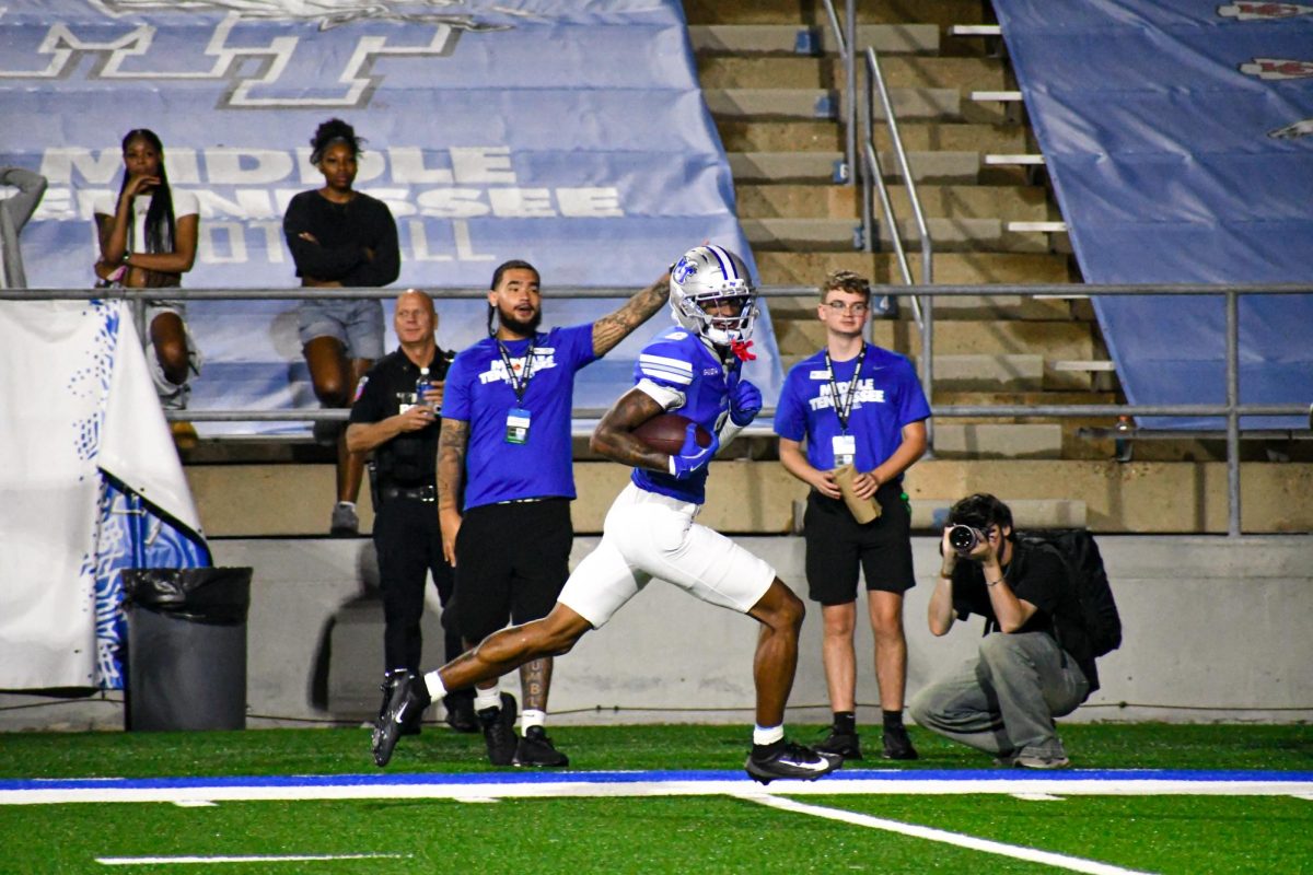 MTSU's Amorion Walker sprints to the endzone after catching a pass against Marshall, at Floyd Stadium on Sept. 20, 2025.