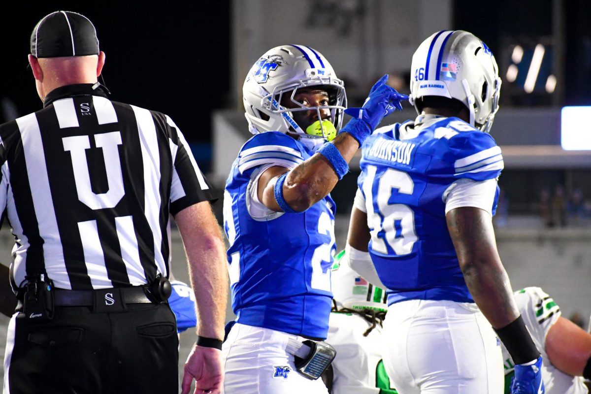 MTSU's Juwon Gaston (22) and Reggie Johnson (46) after a play against Marshall, at Floyd Stadium on Sept. 20, 2025.