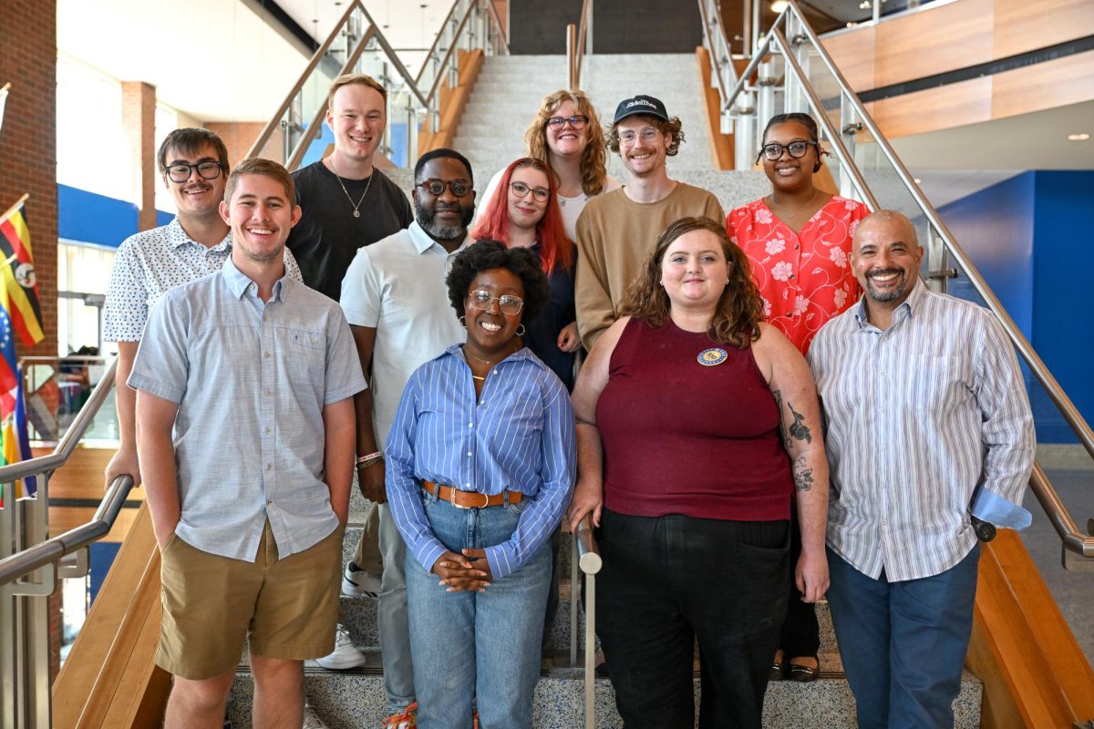 Group photo of the panelists and current Sidelines members in the Student Union on Sept. 18, 2025.