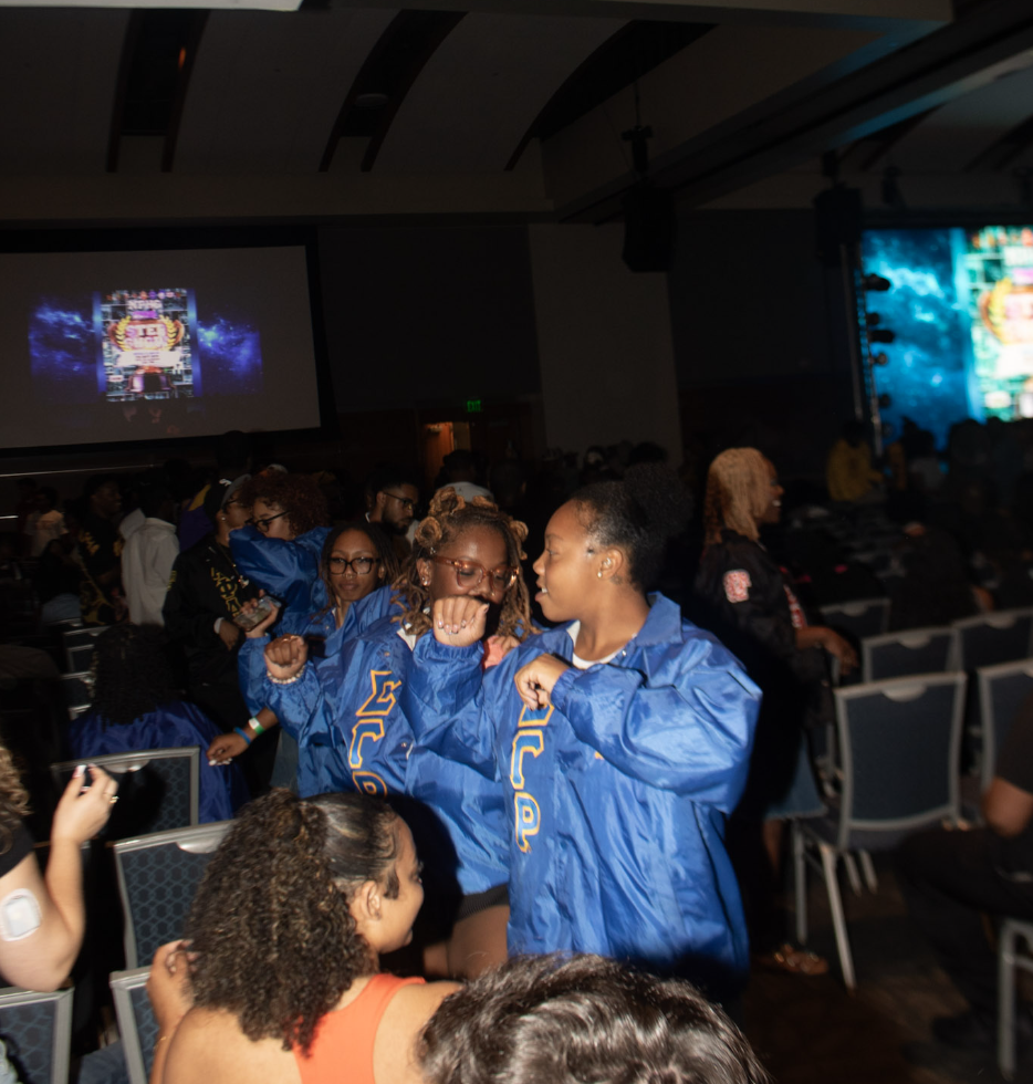 The sisters of Fisk University's Sigma Gamma Rho chapter dance during an intermission at the 2025 NPHC step show at MTSU.