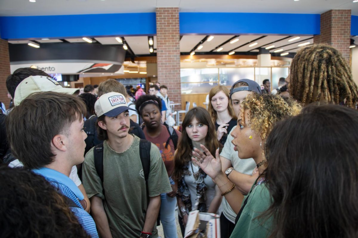 Students continue to debate the morality of abortion in the Student Union atrium even after Joshua Haymes ended his event  on Oct. 1, 2025.