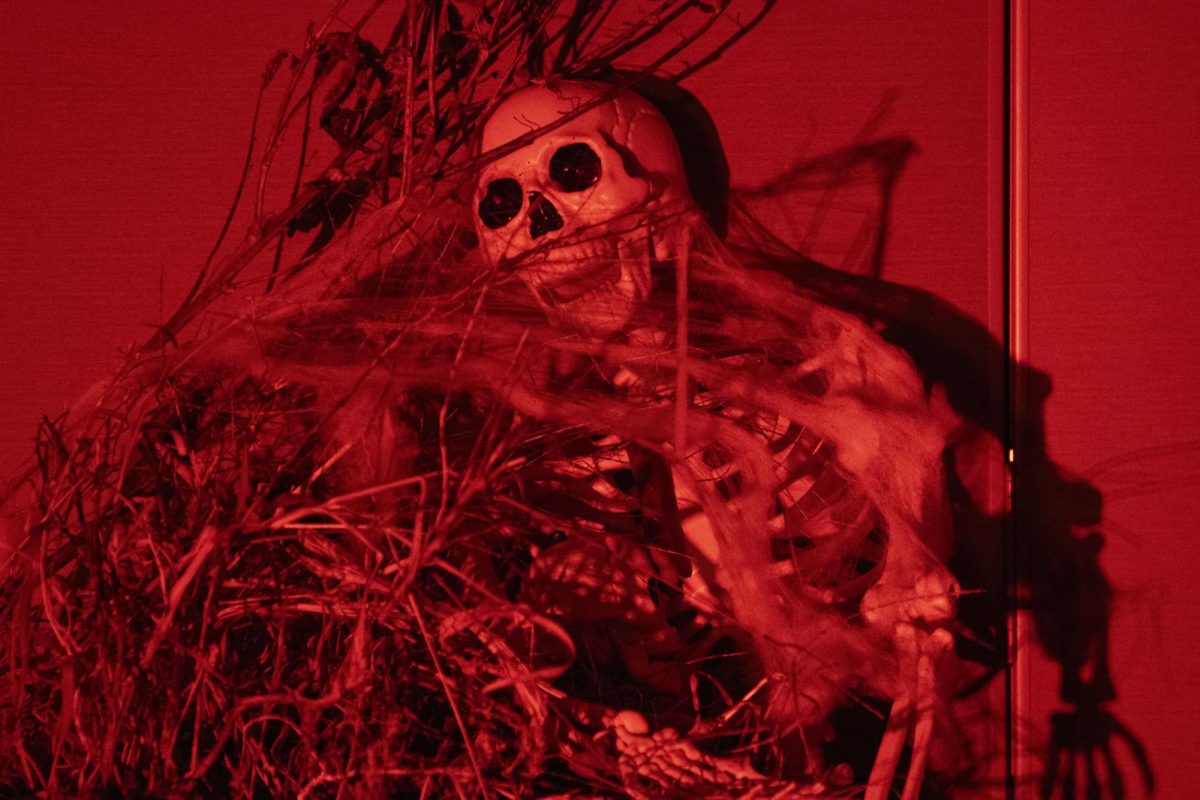 A plastic skeleton sits in a simulated war zone at the "Horrors of War" event on Oct. 27, 2025, in the Keathley University Center.