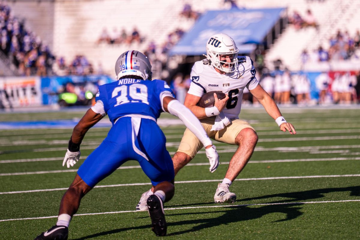 FIU quarterback Joe Pesansky runs towards the endzone in a game against MTSU at Floyd Stadium on Nov. 8, 2025.