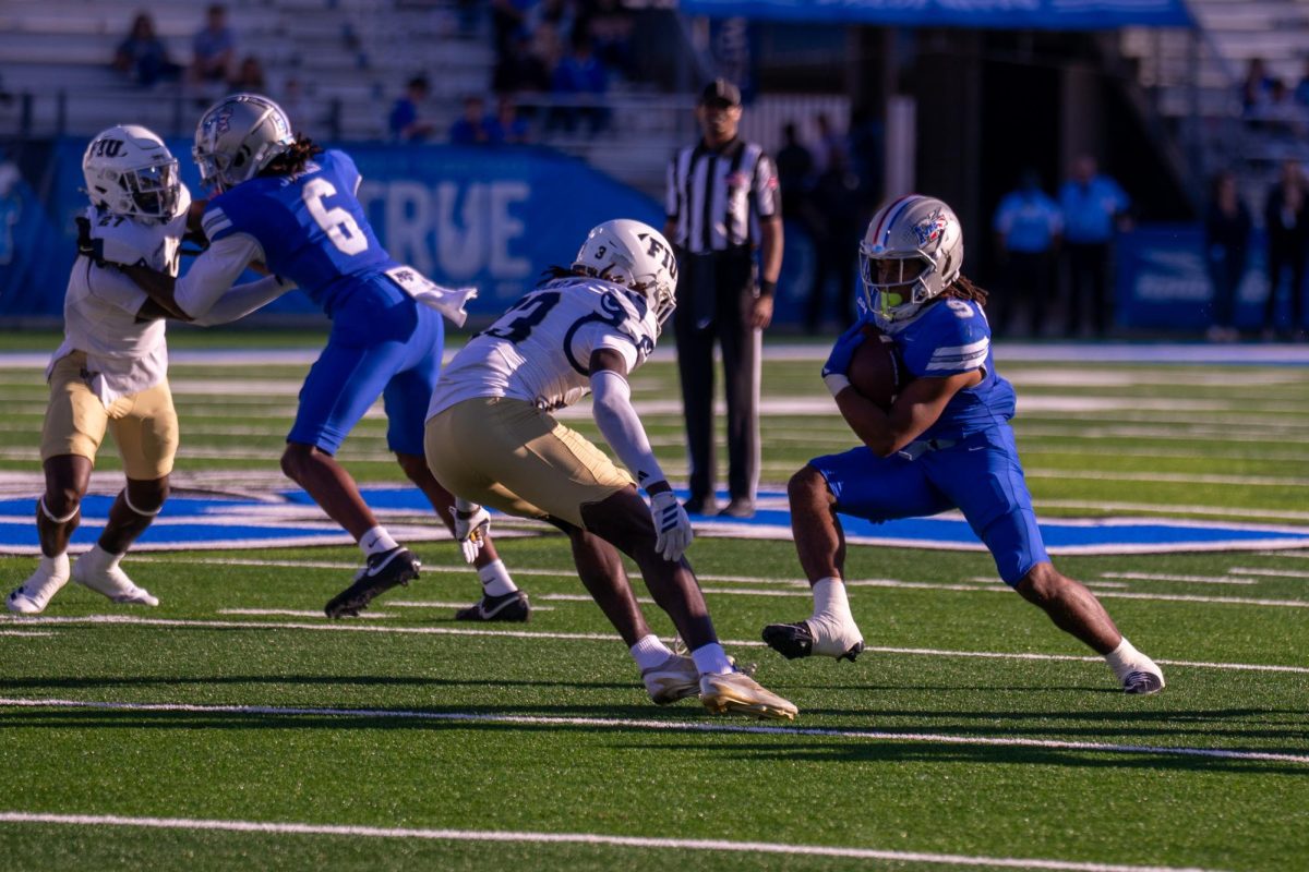 MTSU running back Jekail Middlebrook looks to make a move in a game against FIU at Floyd Stadium on Nov. 8, 2025.