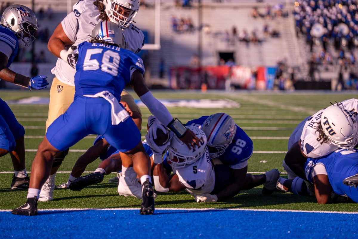 FIU running back Kejon Owens reaches for the endzone in a game against MTSU at Floyd Stadium on Nov. 8, 2025.