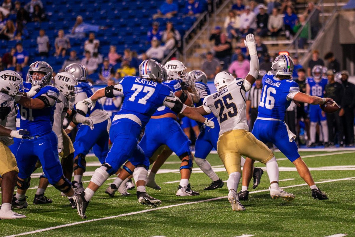 MTSU quarterback Roman Gagliano throws a pass in a game against FIU at Floyd Stadium on Nov. 8, 2025.