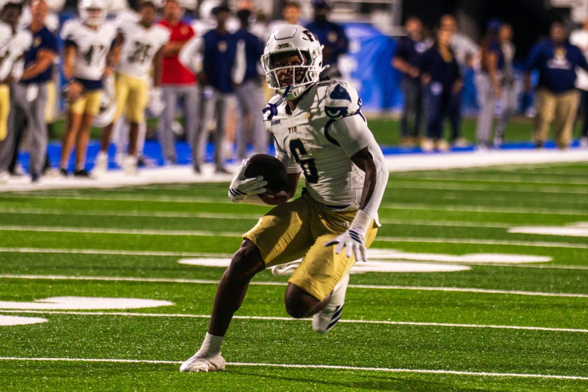 FIU running back Anthony Carrie races towards the endzone in a game against MTSU at Floyd Stadium on Nov. 8, 2025.