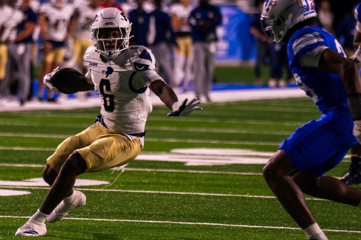 FIU running back Anthony Carrie scores in a game against FIU at Floyd Stadium on Nov. 8, 2025.