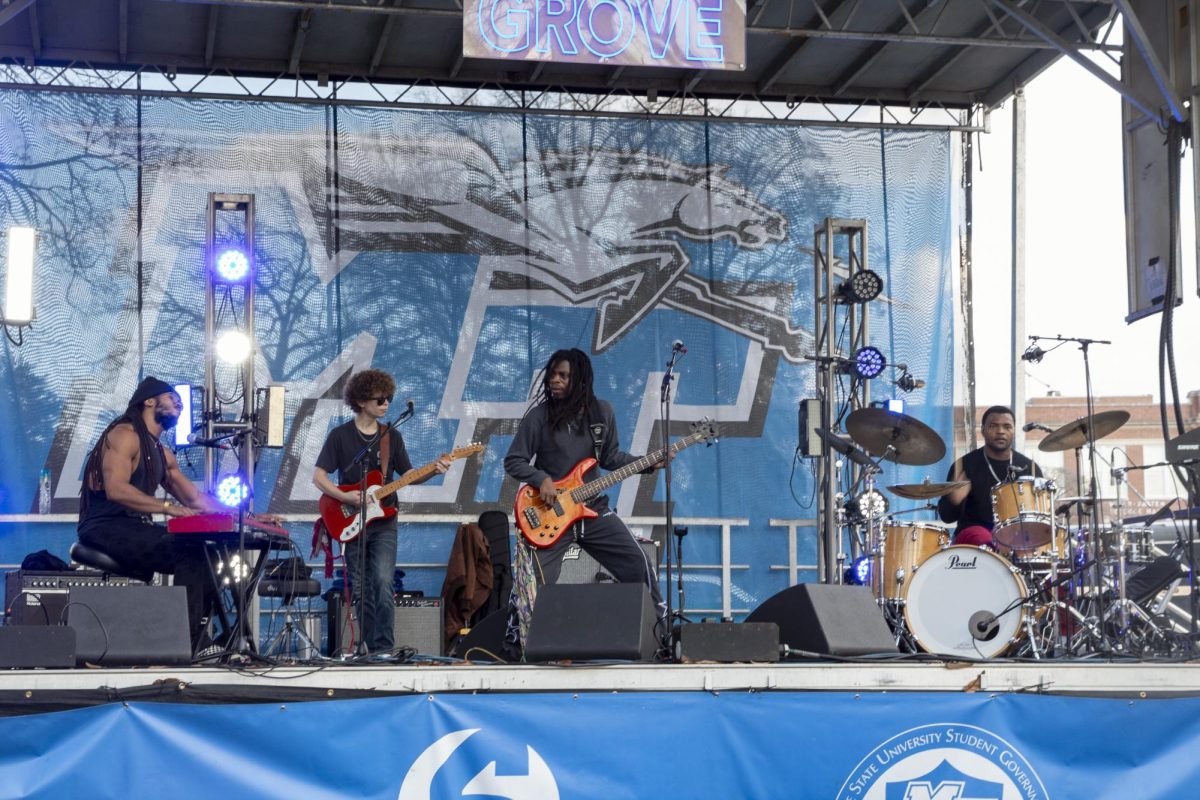 The Psychedelics band playing on stage at the final Party In The Grove for the 2025 season at Walnut Grove on Nov. 22, 2025.