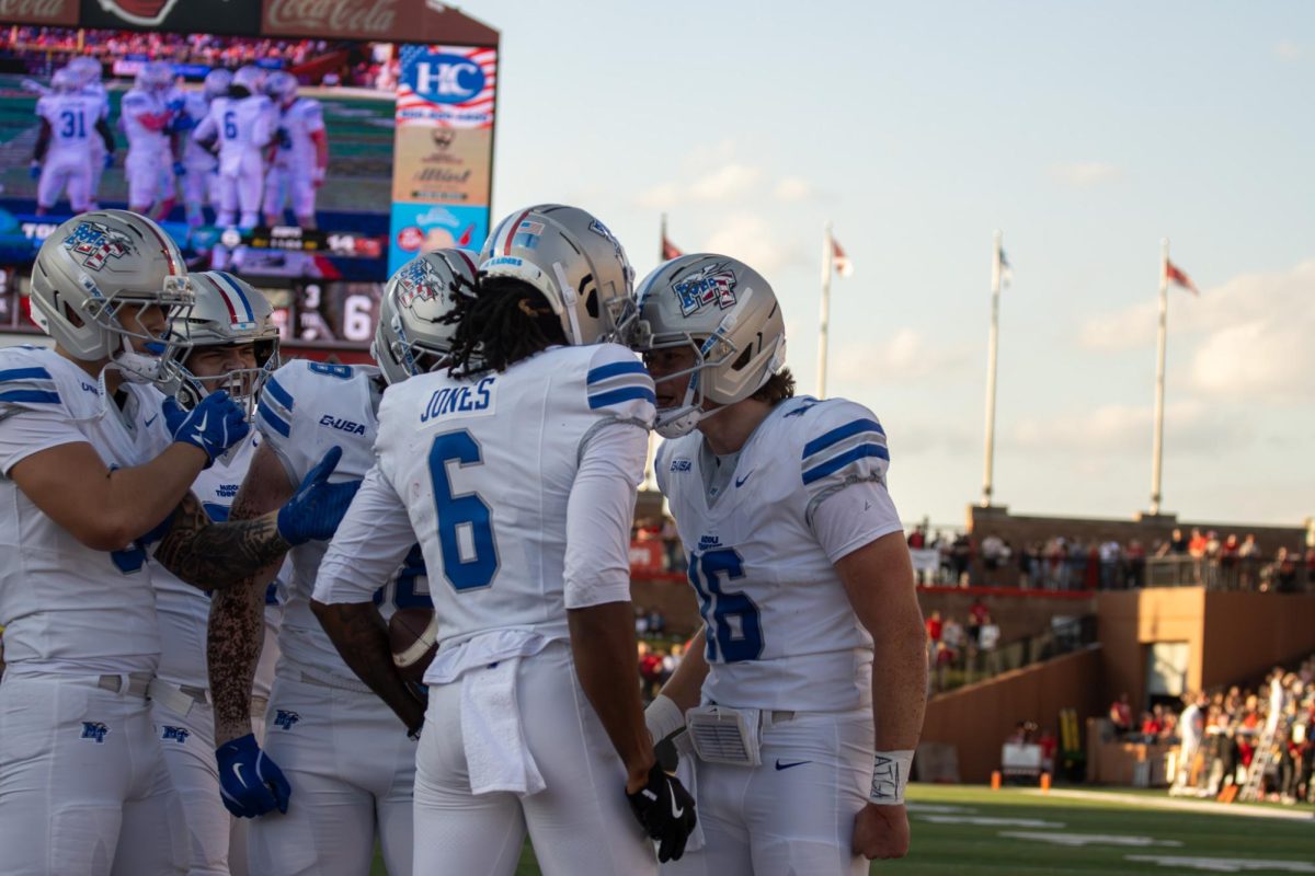 MTSU's AJ Jones (6) and Roman Gagliano (16) celebrate after a touchdown against Western Kentucky at Houchens-Smith Stadium on Nov. 15, 2025.