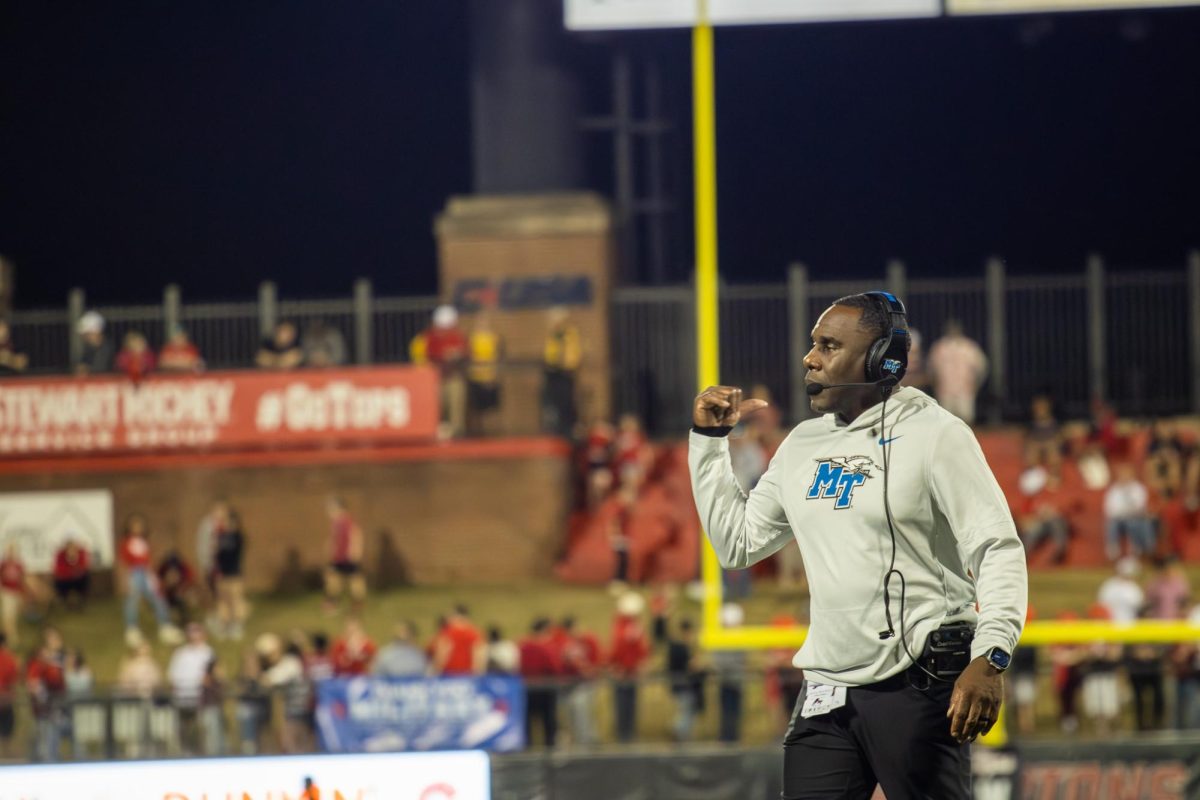 MTSU head coach Derek Mason fist pumps on the sideline against Western Kentucky at Houchens-Smith Stadium on Nov. 15, 2025.
