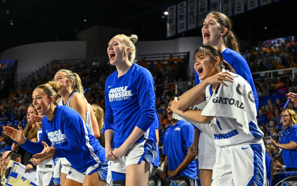 The MTSU bench celebrates a made three pointer during a game against No. 15 Tennessee, at the Murphy Center on Nov. 20, 2025.