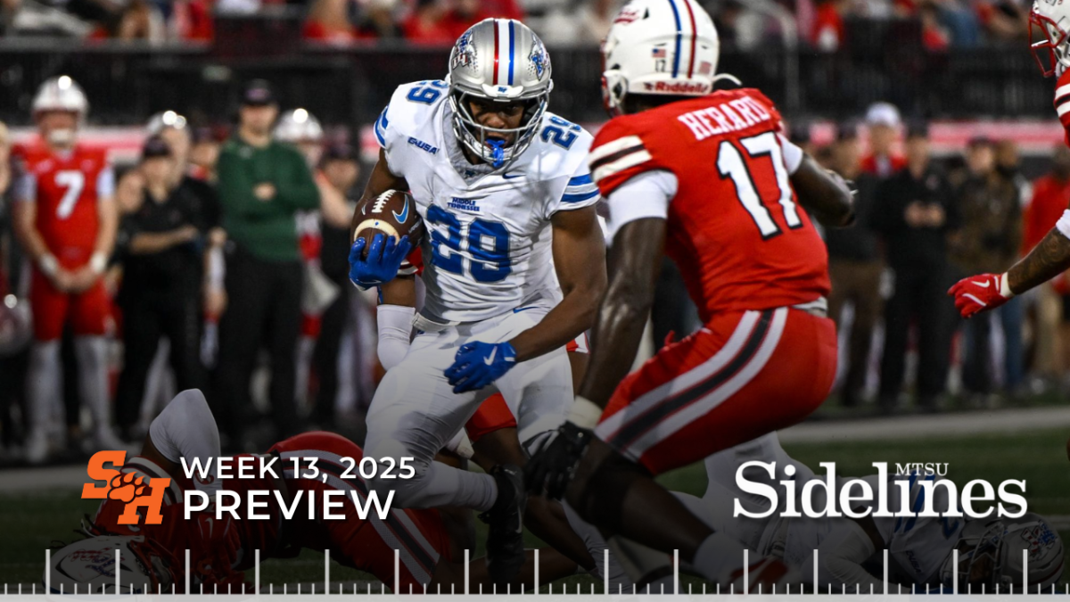 MTSU running back DJ Taylor fights through contact during a game against Western Kentucky at Houchens-Smith Stadium on Nov. 15, 2025. 
