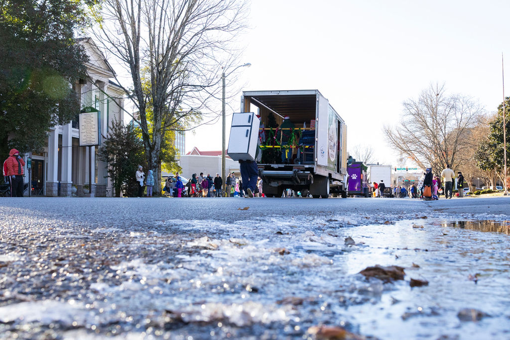Little Guys Movers float rolls along in the Murfreesboro Christmas Parade on E Main St. on Dec. 14, 2025 

 
