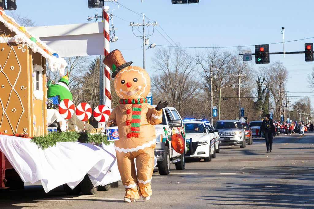 Gingerbread man marches along their float in the Murfreesboro Christmas Parade on E Main St. on Dec. 14, 2025 

 