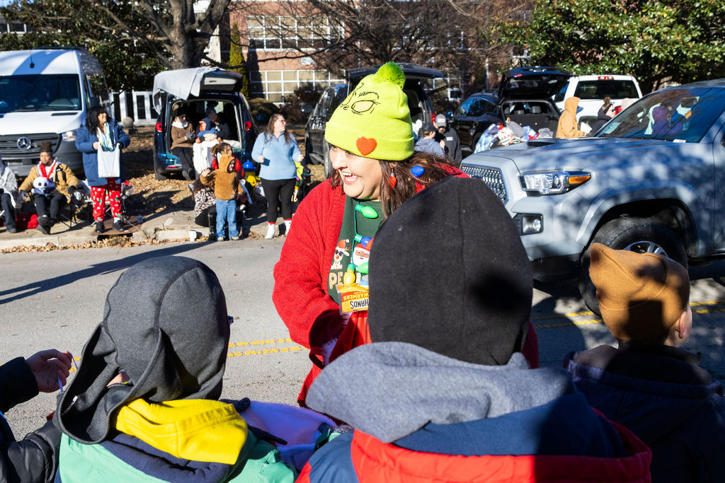 JC Collect passes out handwarmers and candy at the Murfreesboro Christmas Parade on E Main St. on Dec. 14, 2025