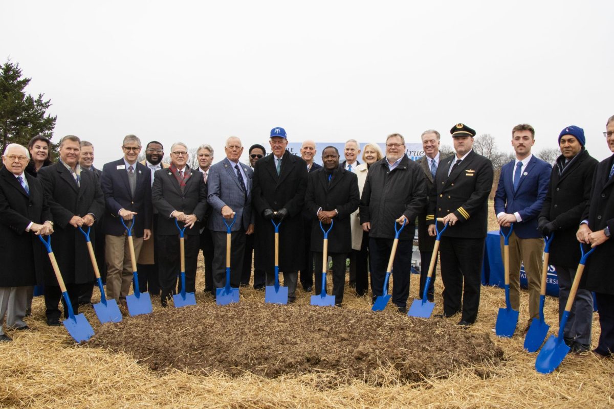 MTSU community members and leaders stand ready to "break ground" at the Shelbyville Municipal Airport on Dec. 2, 2025.