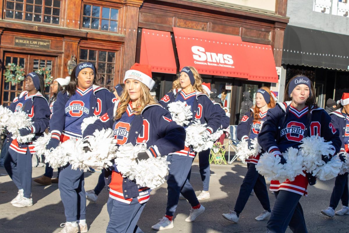  Oakland High School cheerleaders in the parade on Dec. 14, 2025.