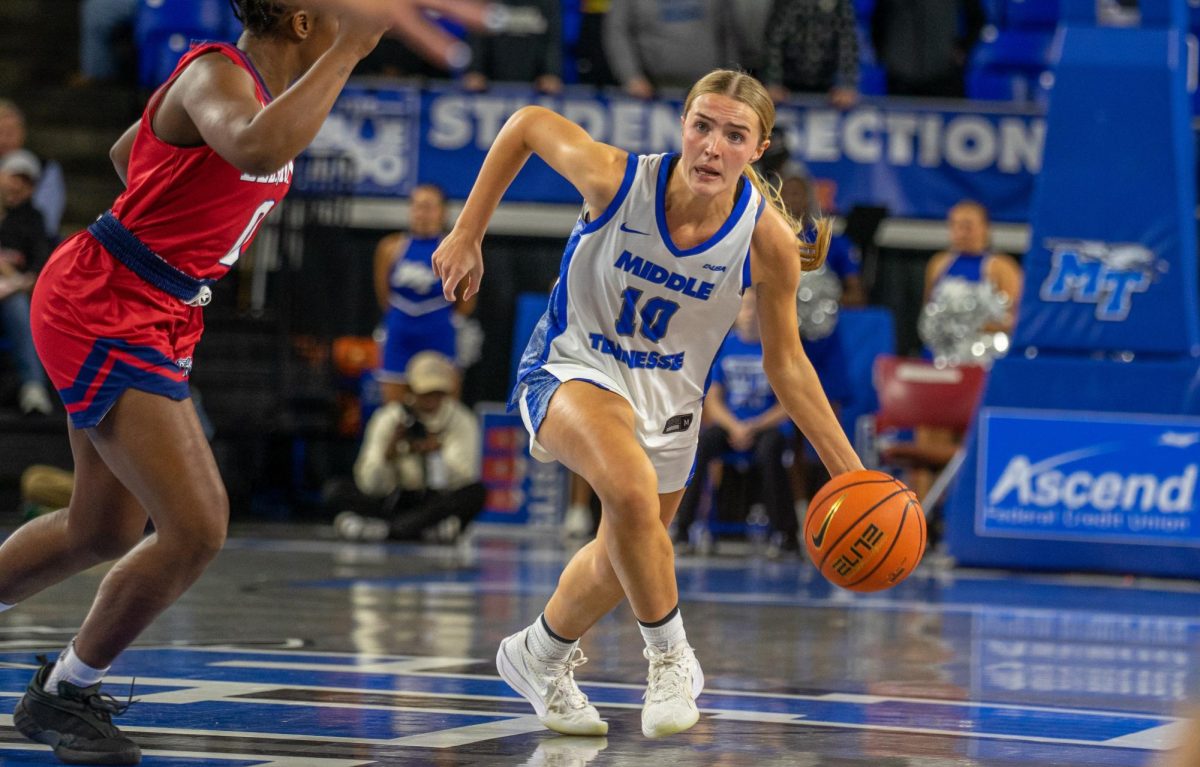 MTSU's Kirston Verhulst looks to dribble by a Belmont defender during a game at the Murphy Center on Dec. 3, 2025.