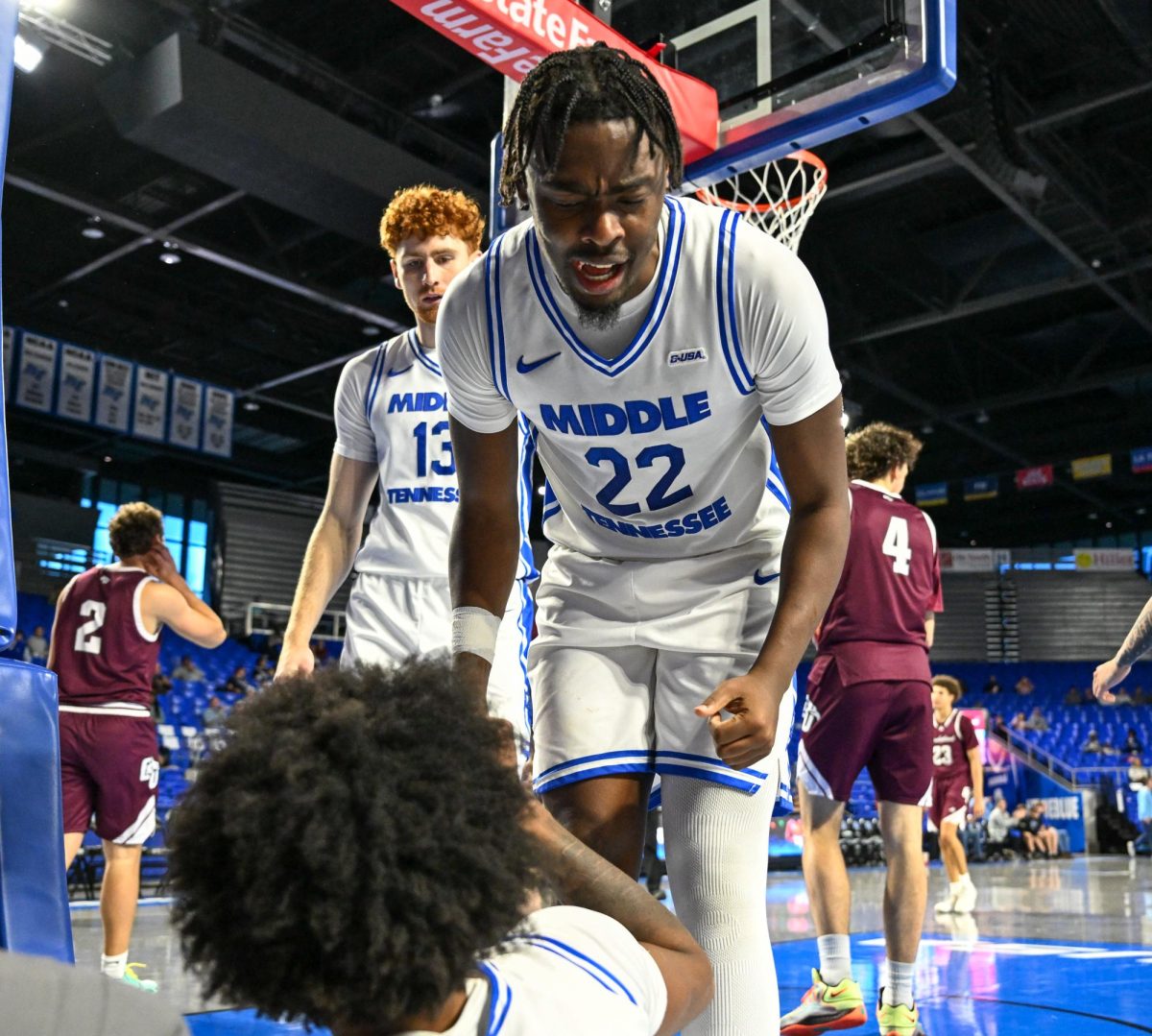 MTSU guard Kamari Lands celebrates with MTSU forward Torey Altson after a contested bucket during a game against Cumberland, inside the Murphy Center on Dec. 21, 2025. 