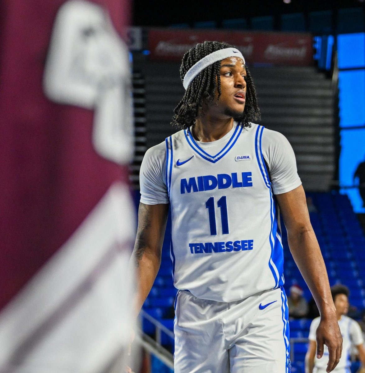 MTSU guard Tre Green looks to the bench before an inbound during a game against Cumberland, inside the Murphy Center on Dec. 21, 2025. 