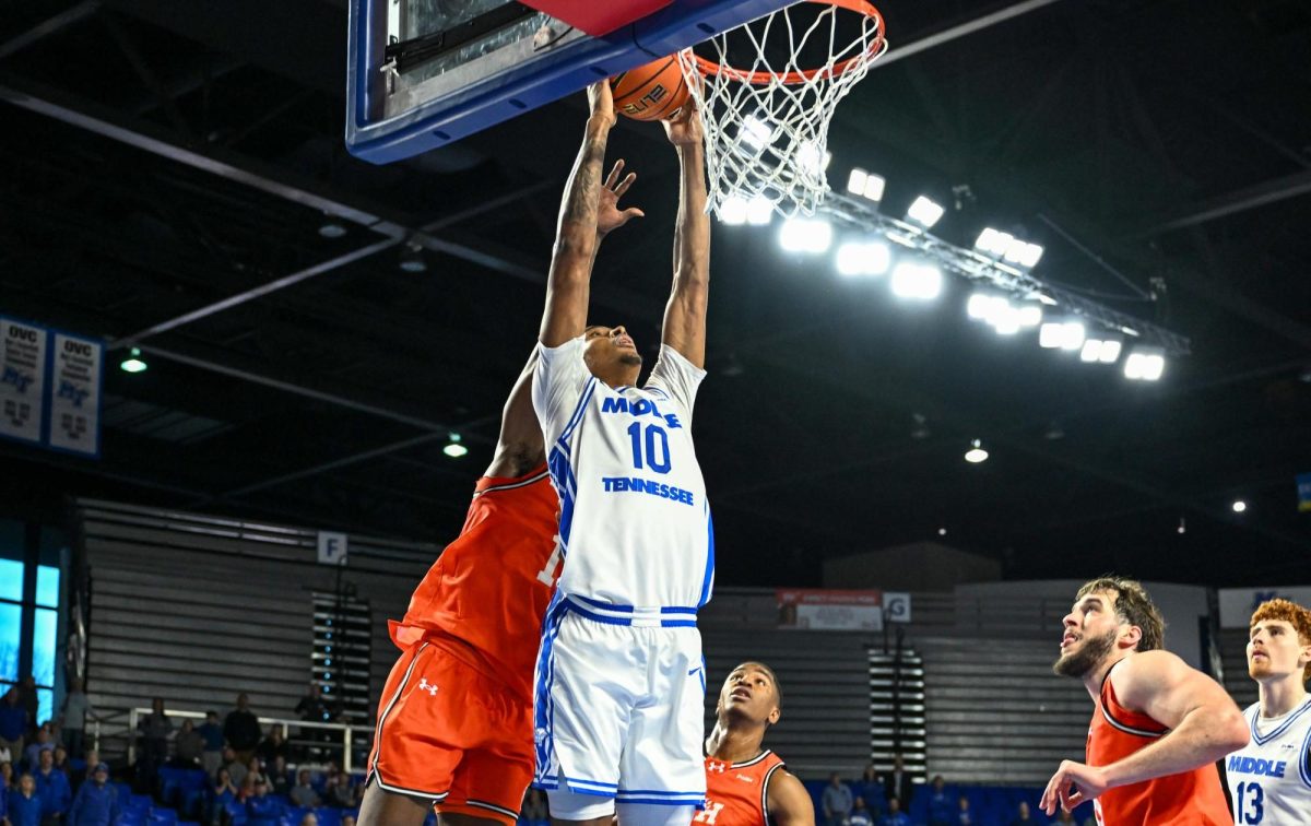 MTSU forward Torey Alston slams home the game winning dunk with five seconds remaining during a game against Sam Houston, inside the Murphy Center on Jan. 4, 2026.