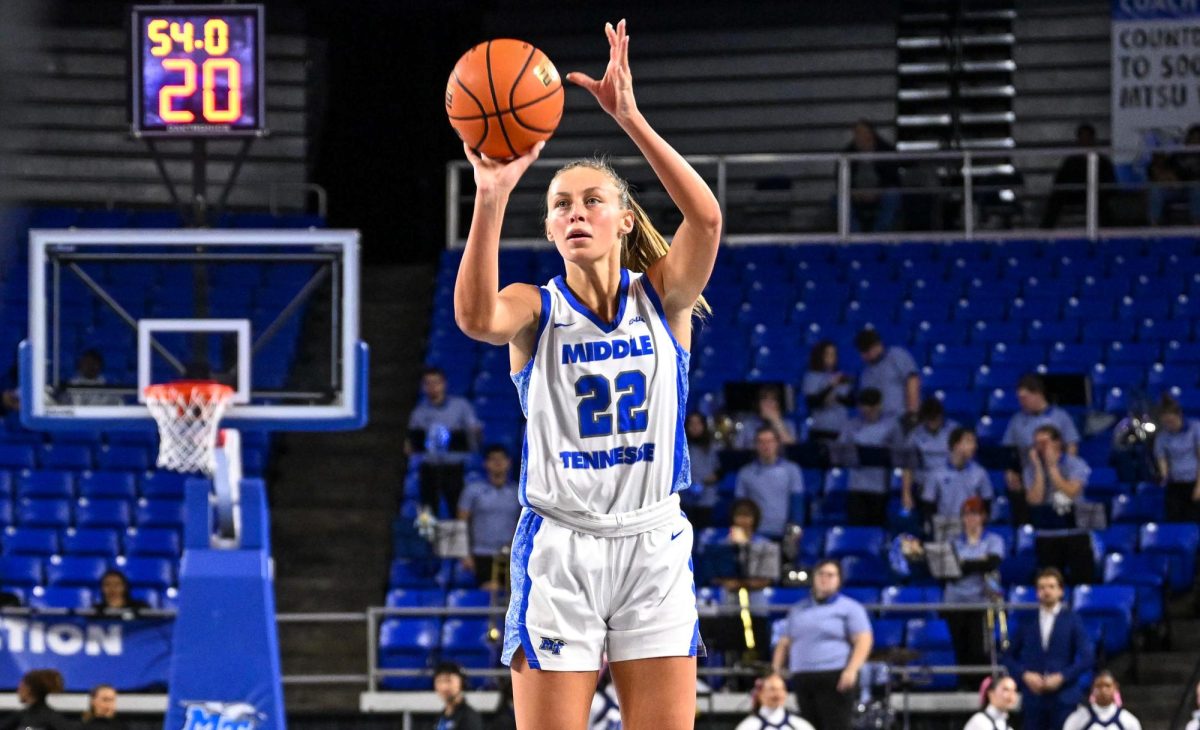 MTSU guard Macie Phifer launches a three pointer during a game against Liberty, inside the Murphy Center on Jan. 23, 2026.