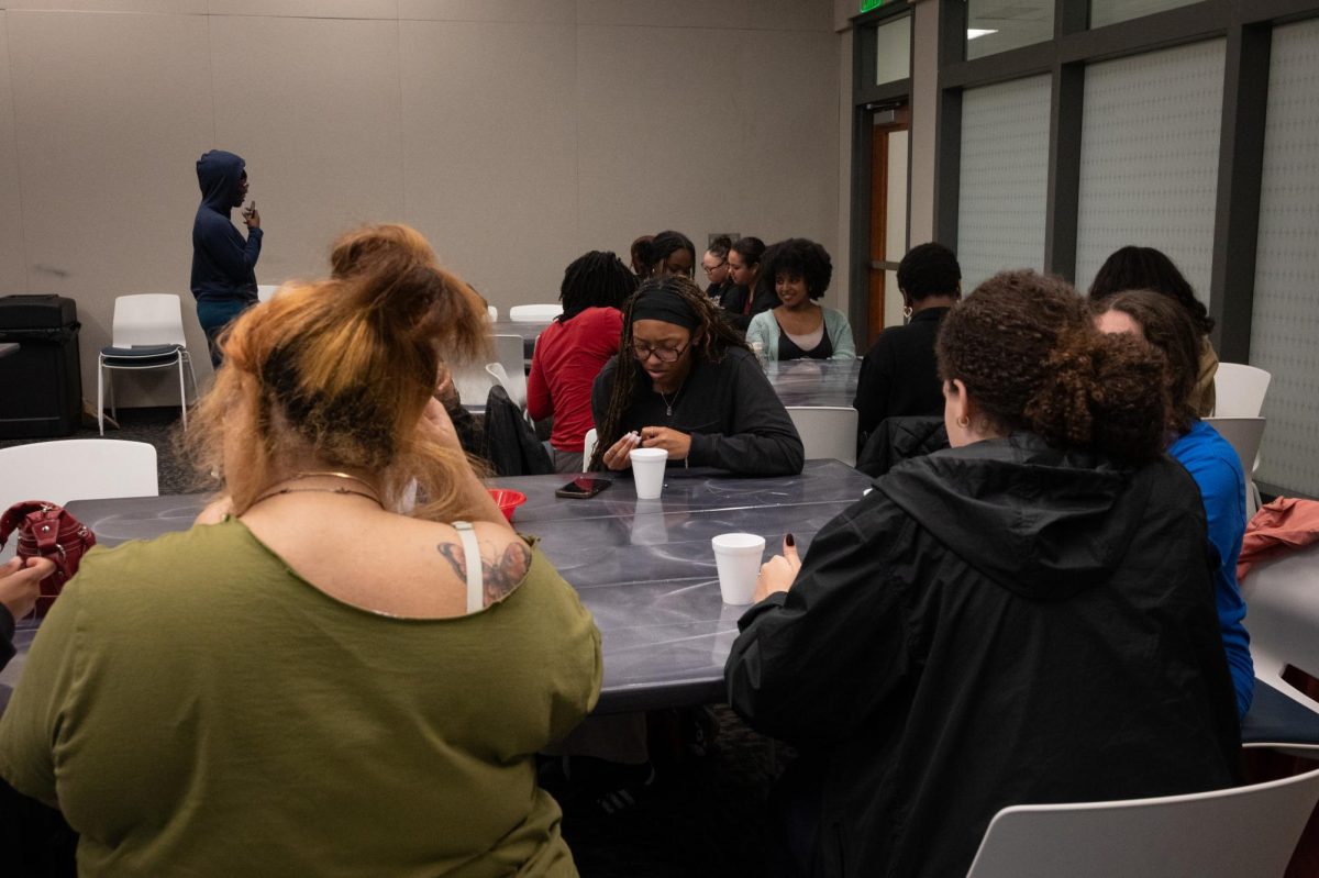 Students assemble waist beads at the Student Union Building, Feb. 18, 2026.