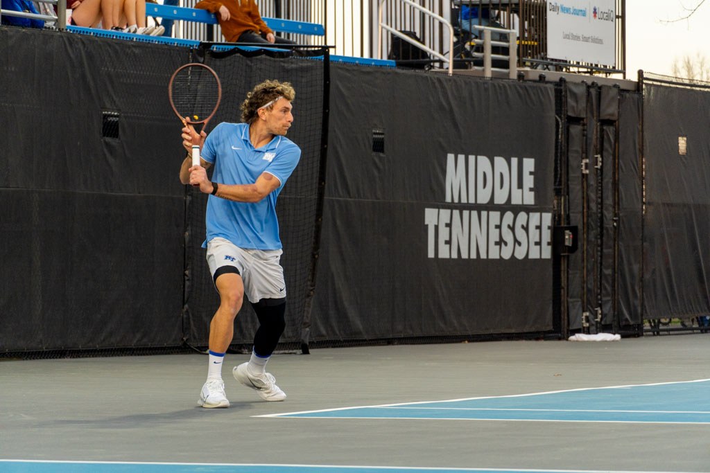 Karim Al-Amin hits a backhand stroke at the MTSU outdoor tennis complex on Feb. 20, 2026. 
