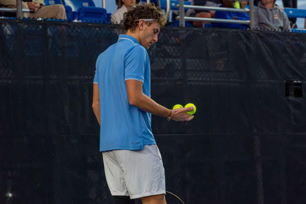 Karim Al-Amin prepares to serve at the MTSU outdoor tennis complex on Feb. 20, 2026. 
