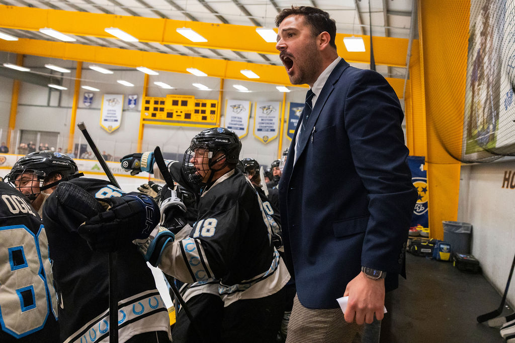 MTSU head coach JJ Murray celebrates a MTSU goal during a game against South Carolina, on Feb. 6, 2026, inside the Ford Ice Hockey Center in Antioch, Tennessee. 
