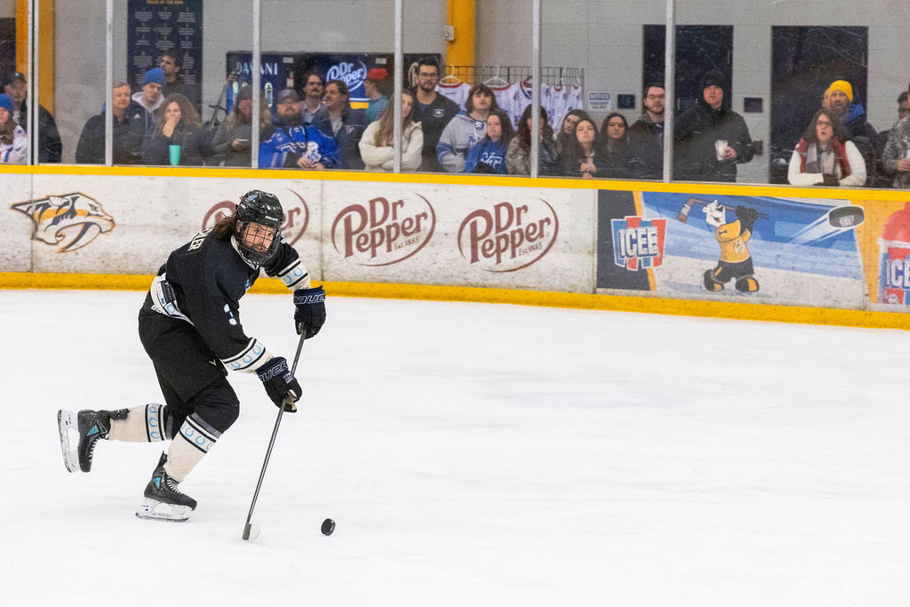 MTSU defenseman Justin Beachler skates with the puck during a game against South Carolina, on Feb. 6, 2026, inside the Ford Ice Hockey Center in Antioch, Tennessee. 
