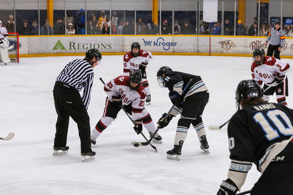 MTSU forward Brendan Ogle (right) and USC forward Micheal Whalen (left) battle for the puck during a faceoff during a game against South Carolina, on Feb. 7, 2026, inside the Ford Ice Hockey Center in Antioch, Tennessee. 
