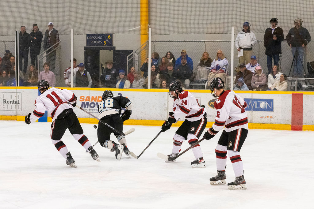 MTSU forward Tommy Chunchukov skates past three USC defenders during a game against South Carolina, on Feb. 7, 2026, inside the Ford Ice Hockey Center in Antioch, Tennessee. 
