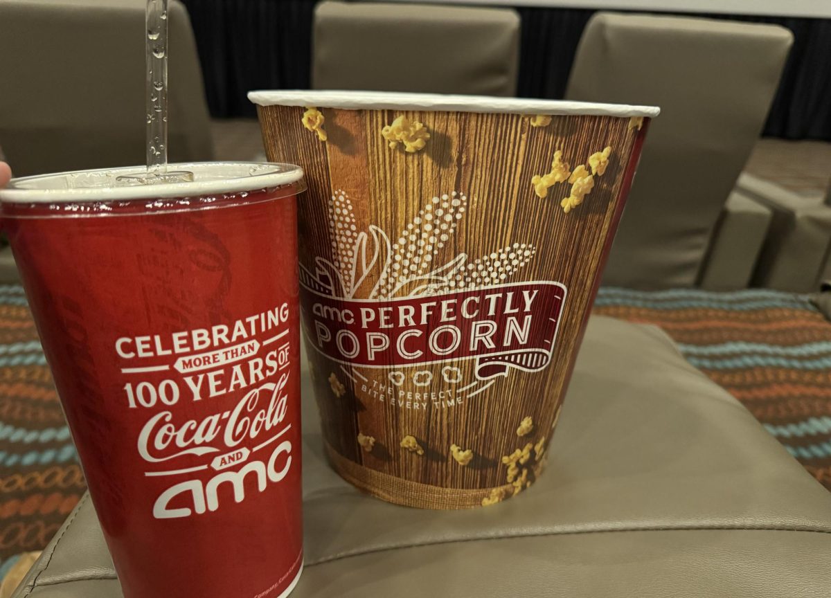 Large Coca-Cola and popcorn set up in a theater seat at AMC Stones River 9 in Murfreesboro, Tennessee. 
