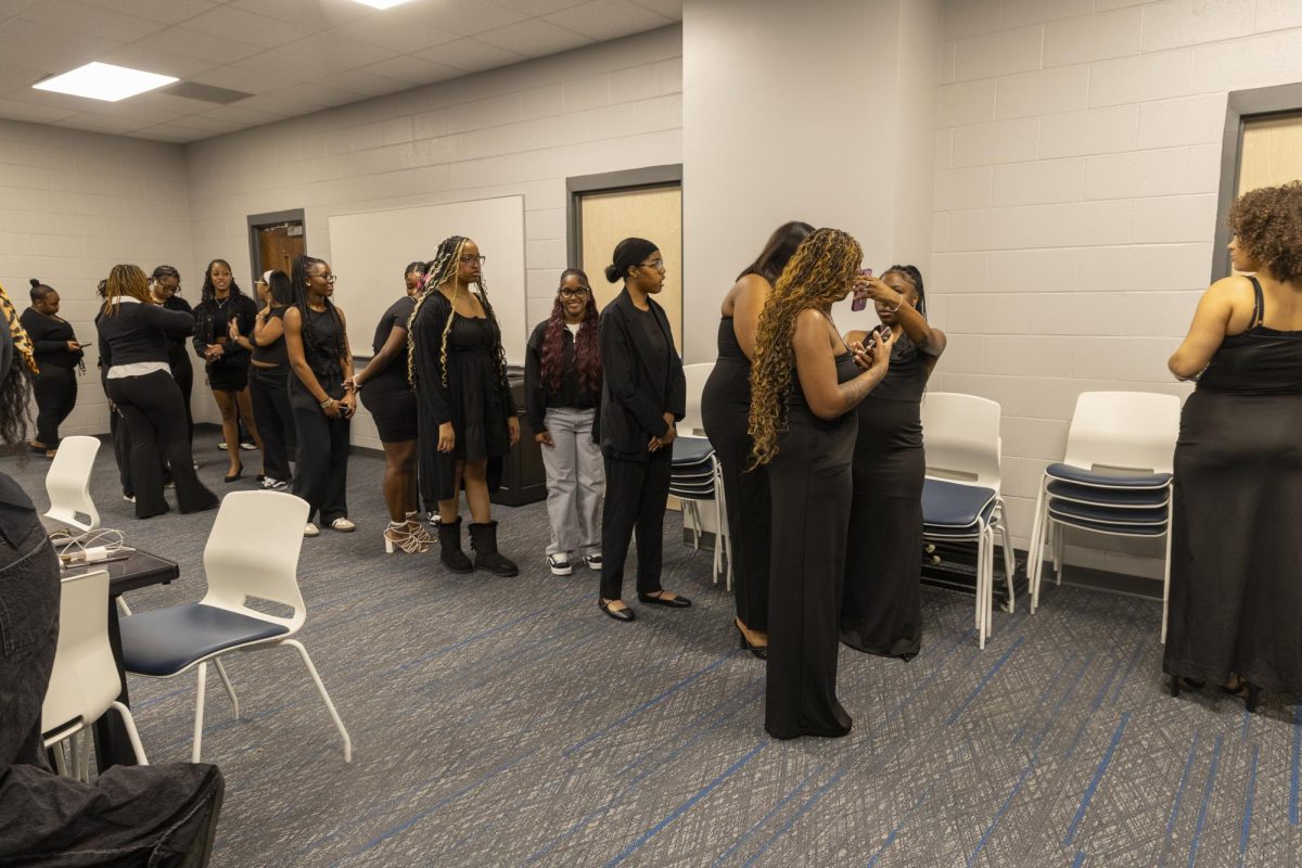 Students wait in line to make their plates during the Seat at the Table Black History event on Feb. 10, 2026.