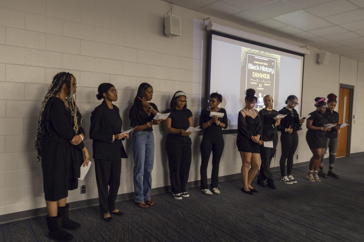 Participants line up to share fun facts about figures in Black history during the Seat at the Table event on Feb. 10, 2026. 