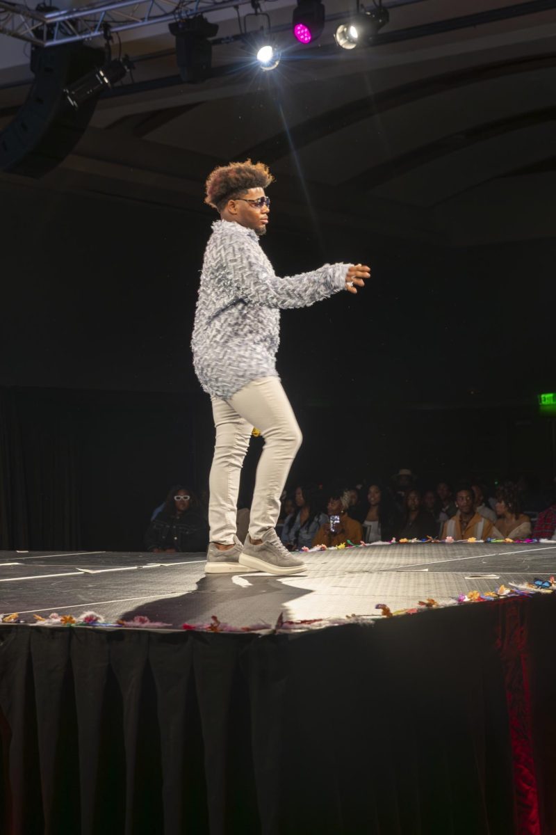 Model walking the runway in Carnival in the Motherland at the ASO fashion show  at MTSU on Feb. 13, 2026