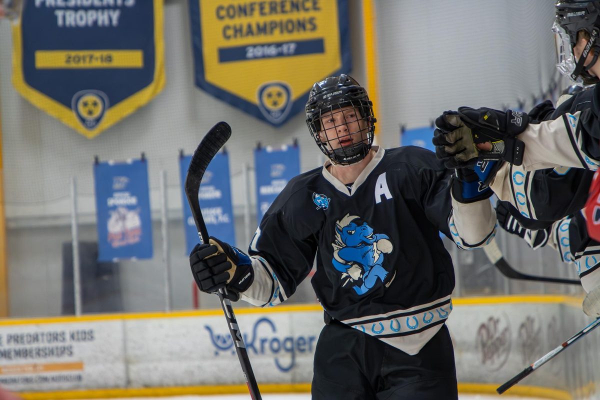 MTSU forward Matthew Siciliano high-fives his teammates following a goal during a game against the University of South Carolina on Feb. 7, 2026, inside the Ford Ice Hockey Center in Antioch, Tennessee. 