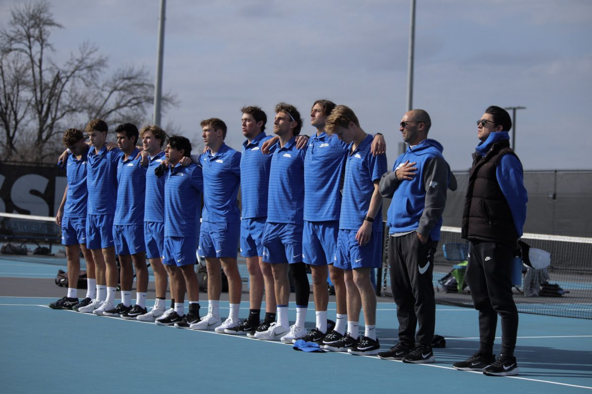 : The MTSU men's tennis team stands together for the National Anthem at the
MTSU outdoor tennis complex on Feb. 20, 2026.