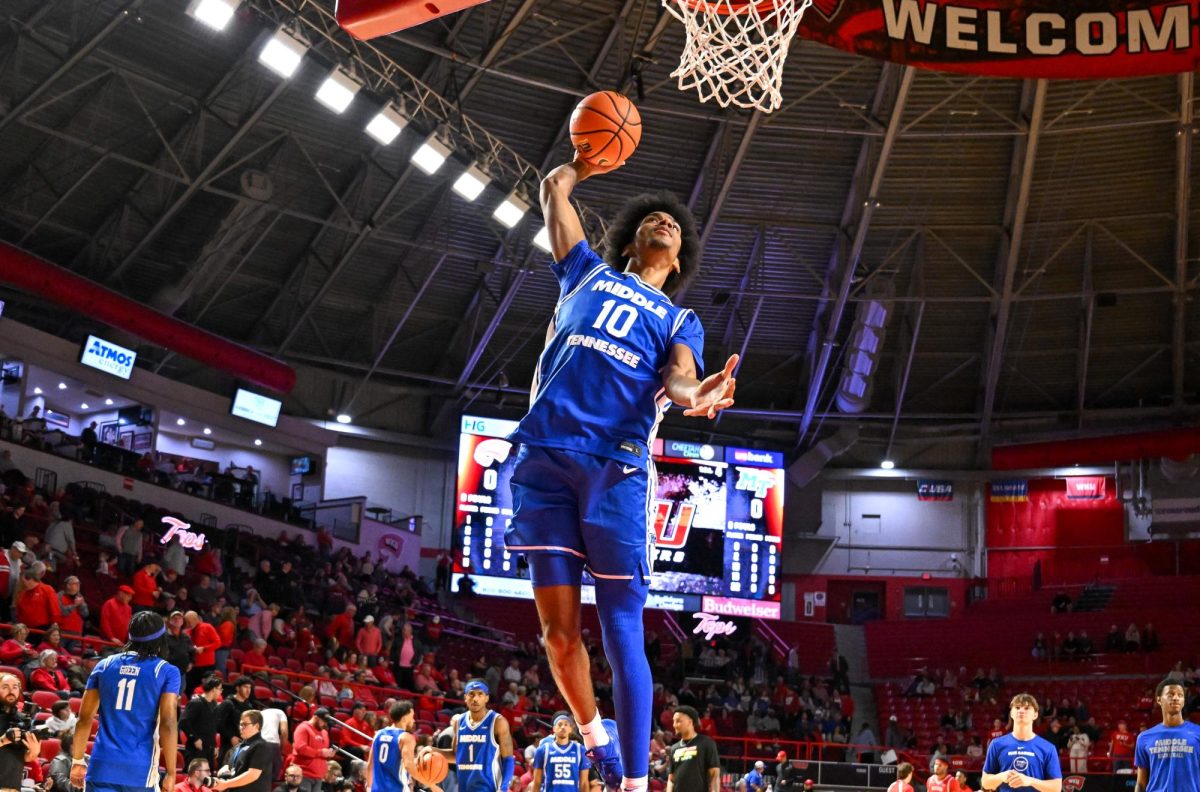 MTSU forward Torey Alston winds up a dunk in pregame shoot-a-round before a game against Western Kentucky, inside E.A. Diddle Arena on Feb. 14, 2026.