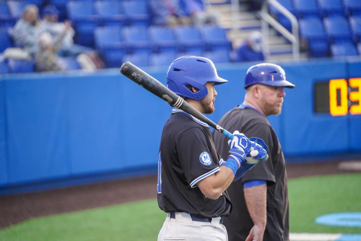 MTSU infielder Dean O’Neil talks to a coach before batting during a game against St. Bonaventure at Reese Smith Jr. Field, Saturday, Feb. 21, 2026.