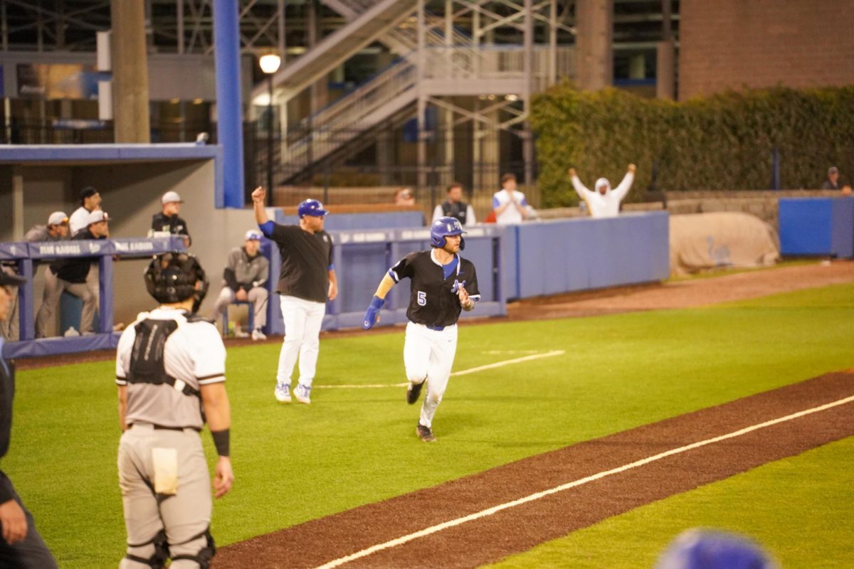 MTSU infielder Matt Wolfe looks at fielders while attempting to score the winning run during a game against St. Bonaventure at Reese Smith Jr. Field, Saturday, Feb. 21, 2026.