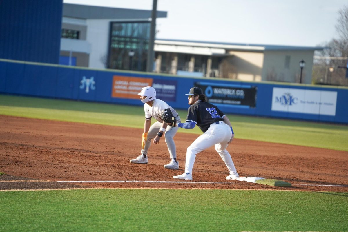 MTSU infielder Dean O’Neil holds St. Bonaventure’s runner on first base during a game against St. Bonaventure at Reese Smith Jr. Field, Saturday, Feb. 21, 2026.