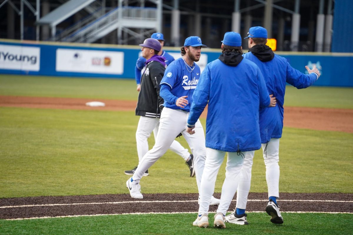MTSU pitcher Landen Burch high-fives teammates after recording a strikeout during a game against Tennessee Tech University at Reese Smith Jr. field on Tuesday, Feb. 23, 2026.
