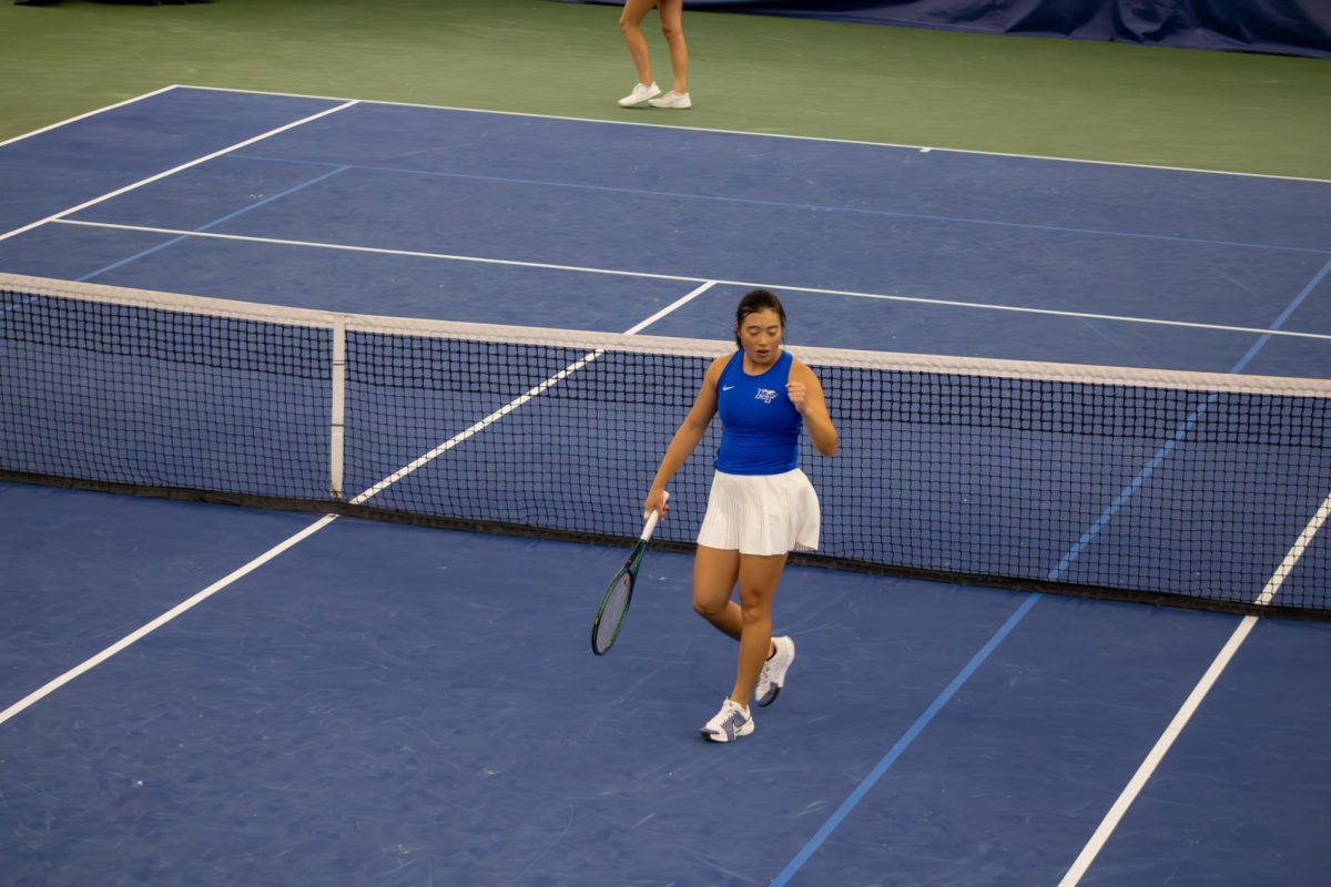 Zenn Lim celebrates after a point against Northwestern University at the Adams Tennis Complex on Jan. 31, 2026. 