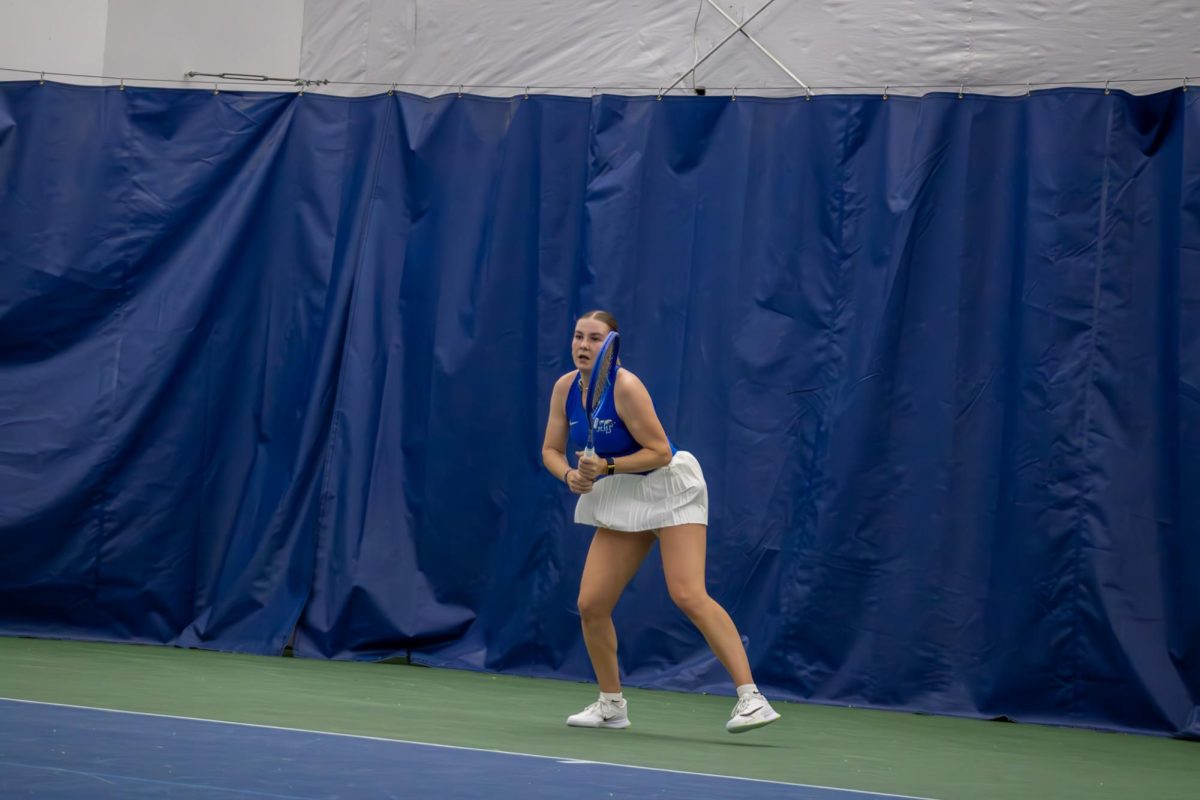 Zora Koenig sets her feet before returning a shot at the Adams Tennis Complex on Jan. 31, 2026. 